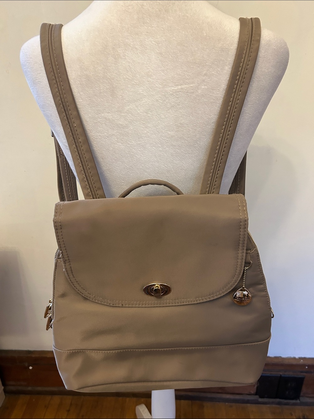 Travelon tan backpack purse Adjustable straps Roomy interior NWOT